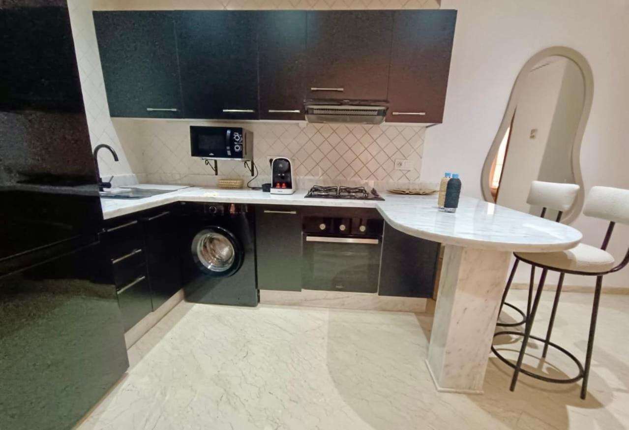 Cosy Appartement Au Coeur De Gueliz มาร์ราเกช ภายนอก รูปภาพ